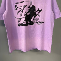 Triple Sevens Lavender Figure Silhouette Logo Graphic Tee