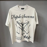 Triple Sevens Off‑White Crucifix Symbol Graphic Tee