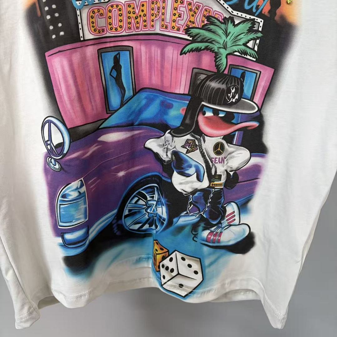 Triple Sevens Off‑White Rhinestone City Cartoon Scene Graphic Tee