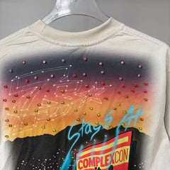 Triple Sevens Off‑White Rhinestone City Cartoon Scene Graphic Tee