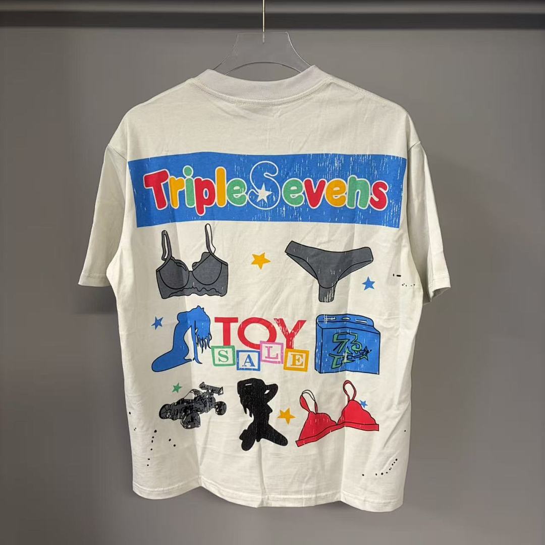 Triple Sevens Off‑White Colorful Cartoon Store Scene Graphic Tee