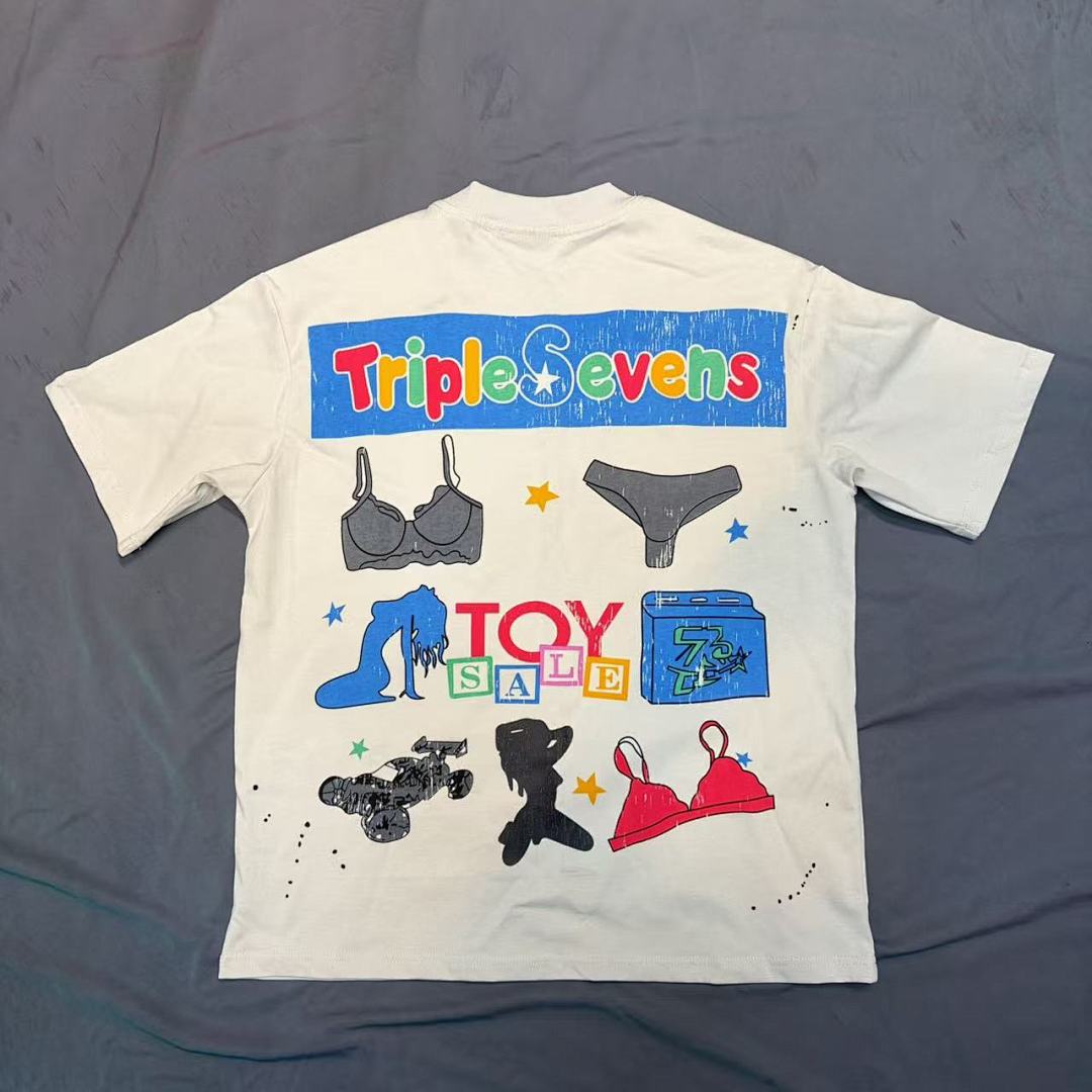 Triple Sevens Off‑White Colorful Cartoon Store Scene Graphic Tee