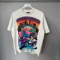 Triple Sevens Off‑White Rhinestone City Cartoon Scene Graphic Tee